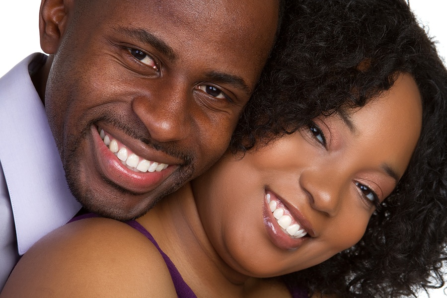 Taking care of your child's teeth : Image showing a happy African couple